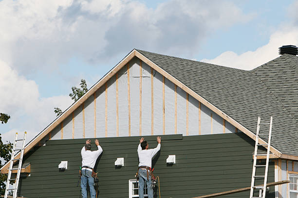 Professional Emergency Siding Repair technician working in Mills River, NC